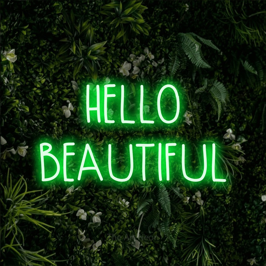 Green LED neon sign reading "Hello Beautiful" against a leafy green wall for bedroom décor