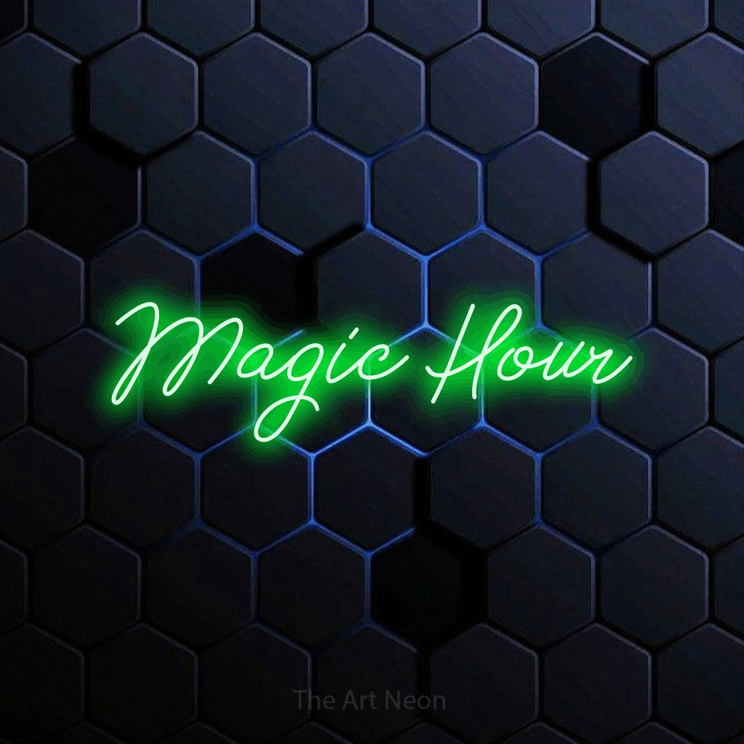 Green script-style LED neon sign reading "Magic Hour" against a blue hexagonal wall for living room décor