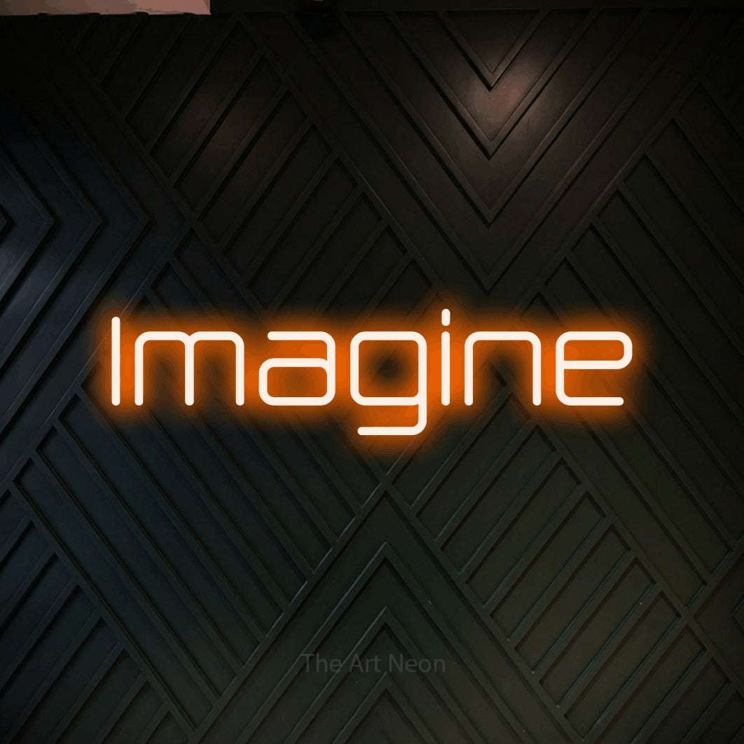 Enseigne néon à DEL à lumière orange, affichant « Imagine » sur un mur géométrique en bois foncé, pour décorer une chambre de bébé
