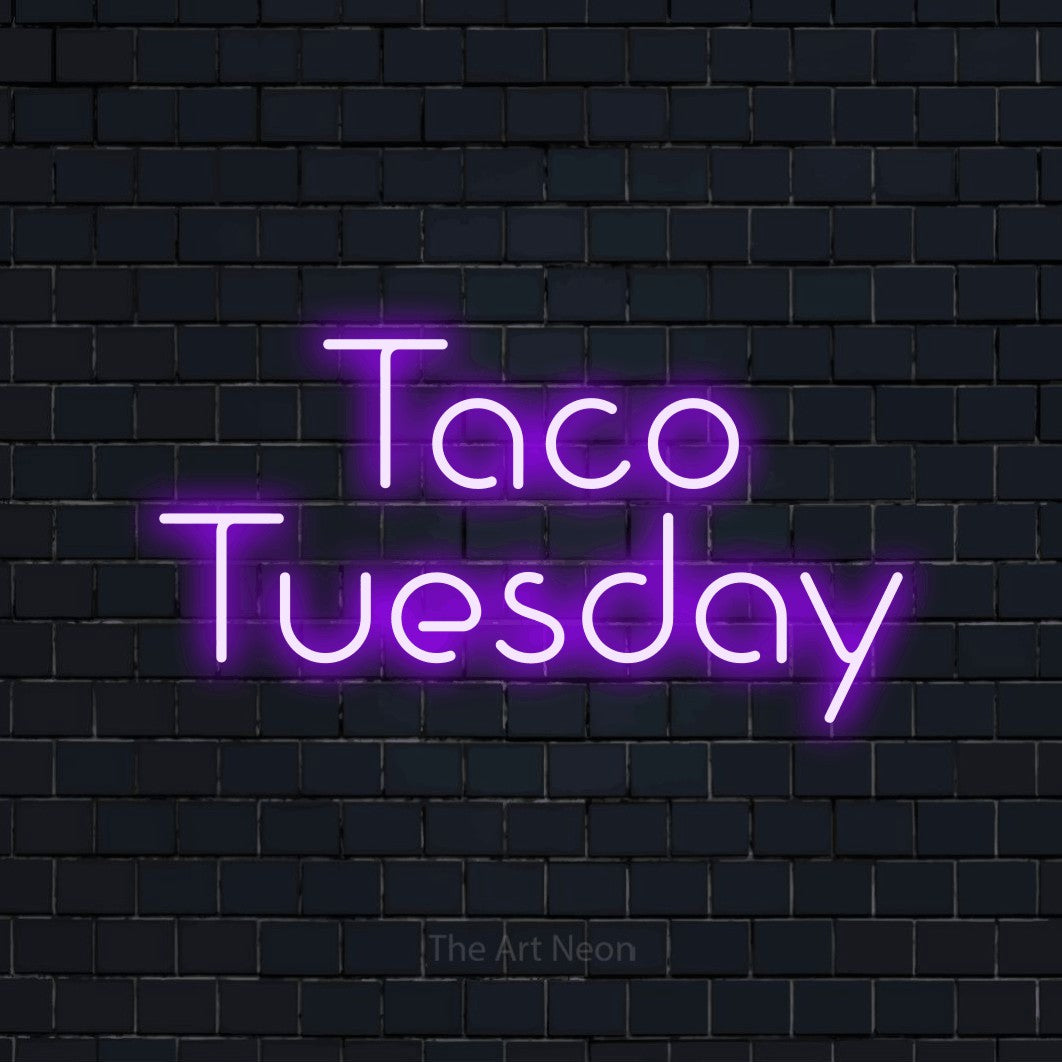 Purple LED neon sign reading "Taco Tuesday" against a dark navy brick wall for kitchen décor
