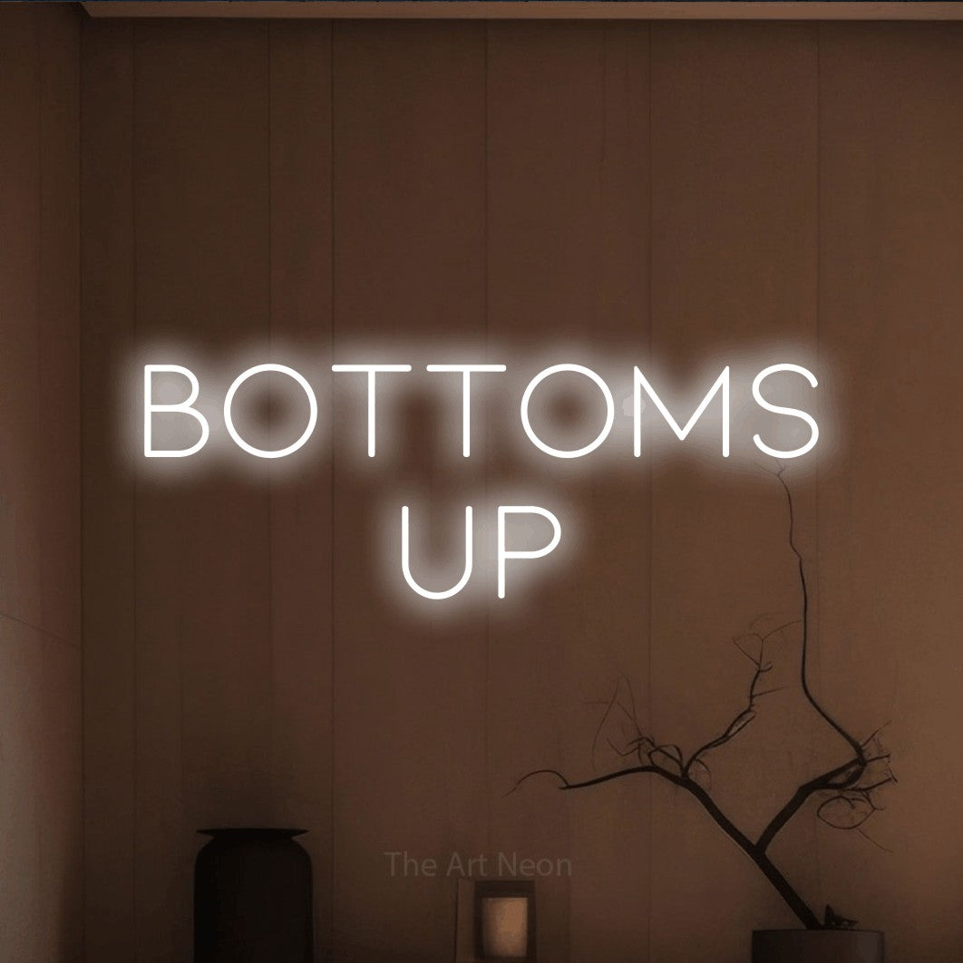 Cool white LED neon sign reading "Bottoms Up" against a warm brown wall for kitchen décor