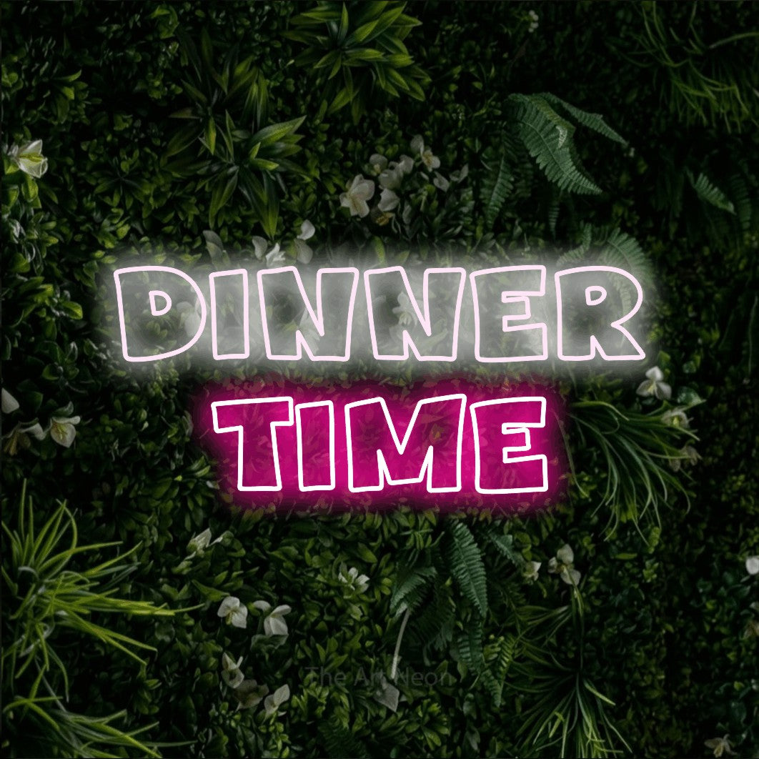 Hot pink and cool white outline-style LED neon sign reading "Dinner Time" against a leafy green wall for restaurant décor