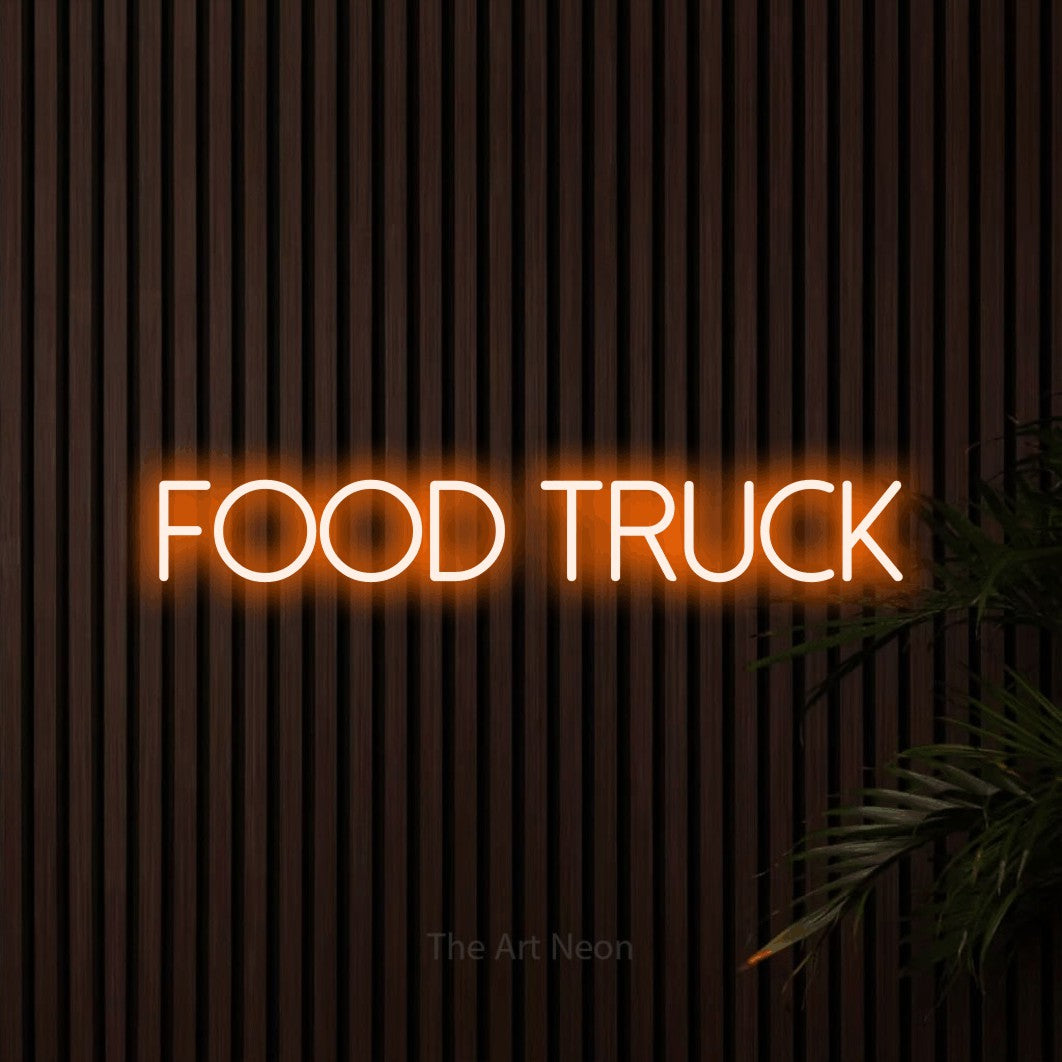 Orange LED neon sign reading "Food Truck" against dark wooden slats for restaurant décor