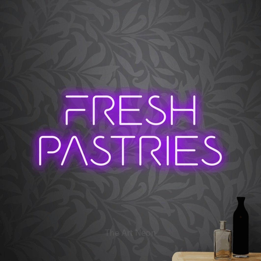 Purple LED neon sign reading "Fresh Pastries" against light grey floral wallpaper for café décor