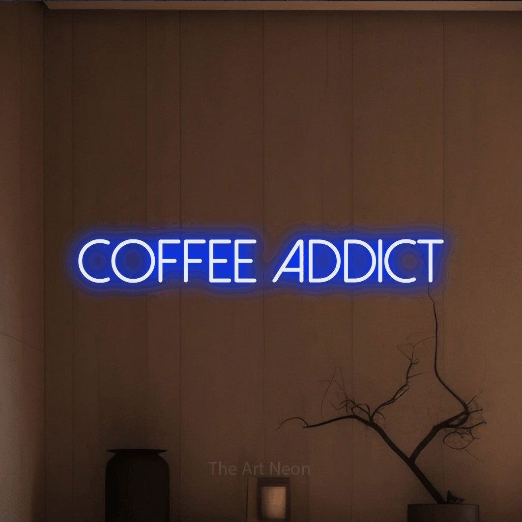Blue LED neon sign reading "Coffee Addict" against a warm brown wall for café décor