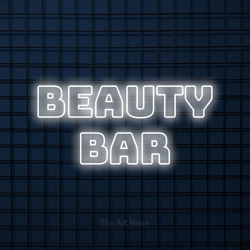 Cool white outline-style LED neon sign reading "Beauty Bar" against a dark blue tiled wall for salon décor