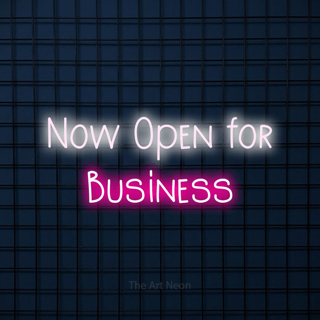 Hot pink and cool white LED neon sign reading "Now Open for Business" against a dark blue tiled wall for office décor