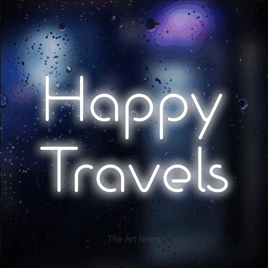 Cool white LED neon sign reading "Happy Travels" against a dark blue bokeh background for hotel décor