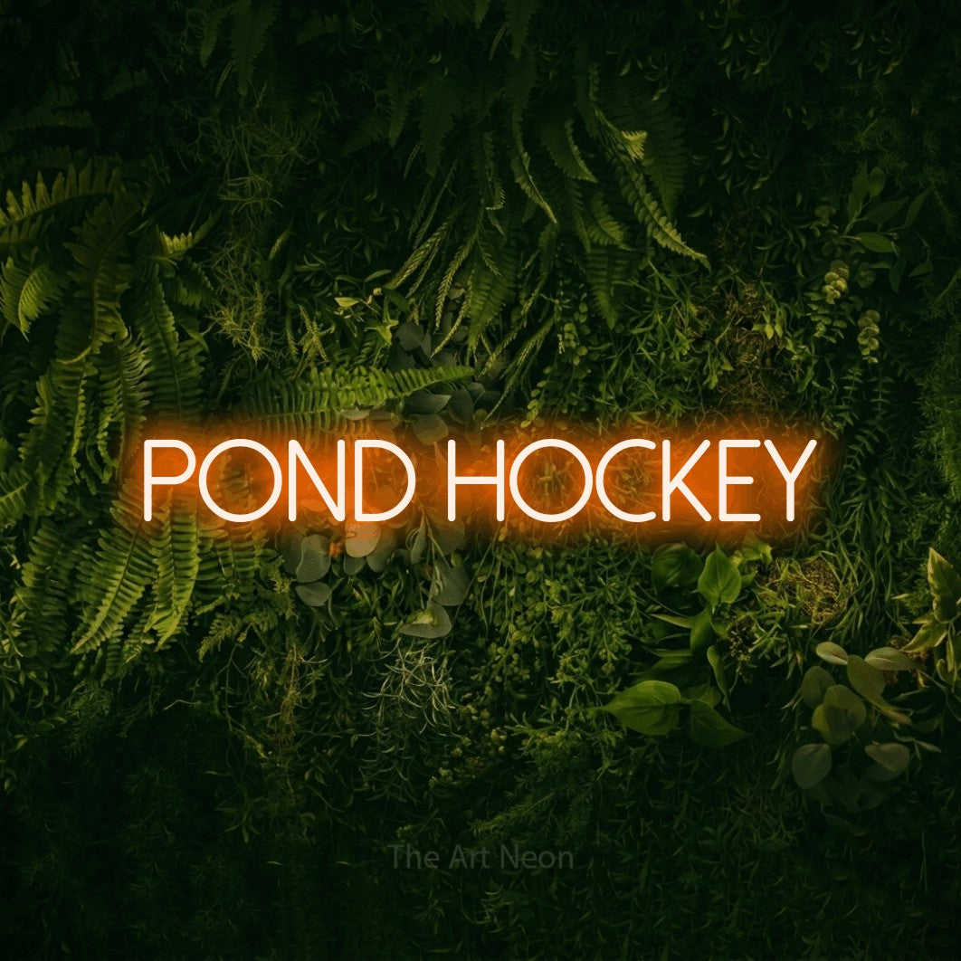 Orange LED neon sign reading "Pond Hockey" against a moss-covered green wall
