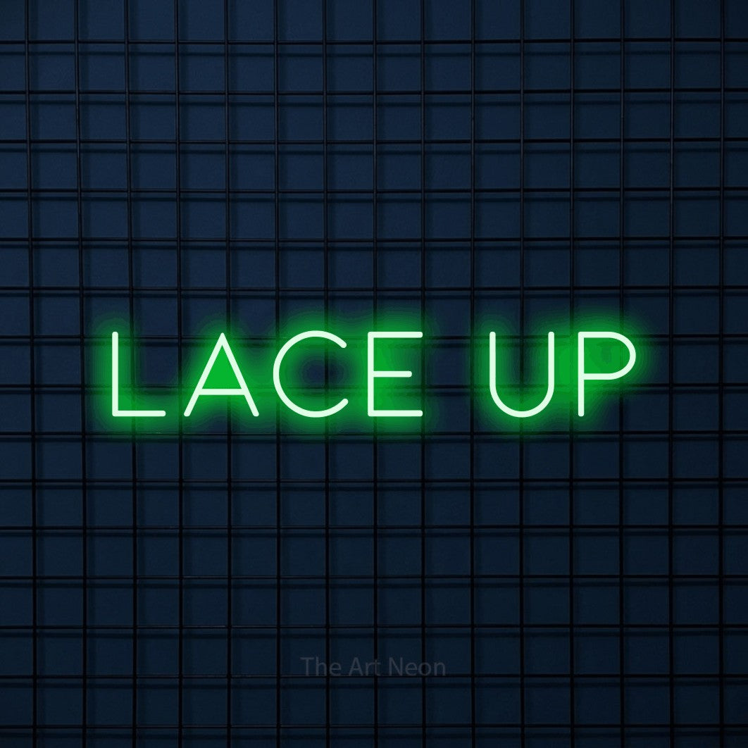 Green LED neon sign reading "Lace Up" against a dark blue tiled wall