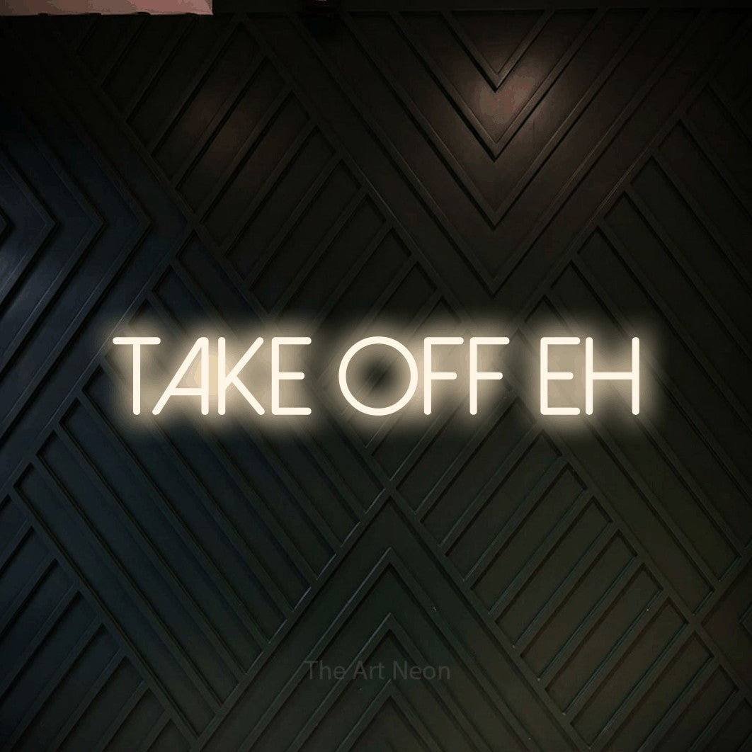 Warm white LED neon sign reading "Take Off Eh" against a dark geometric wood wall