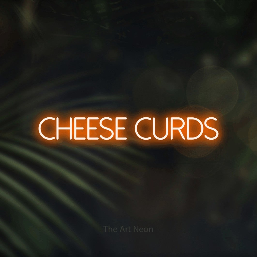 Orange LED neon sign reading "Cheese Curds" against dark blurred palm leaves