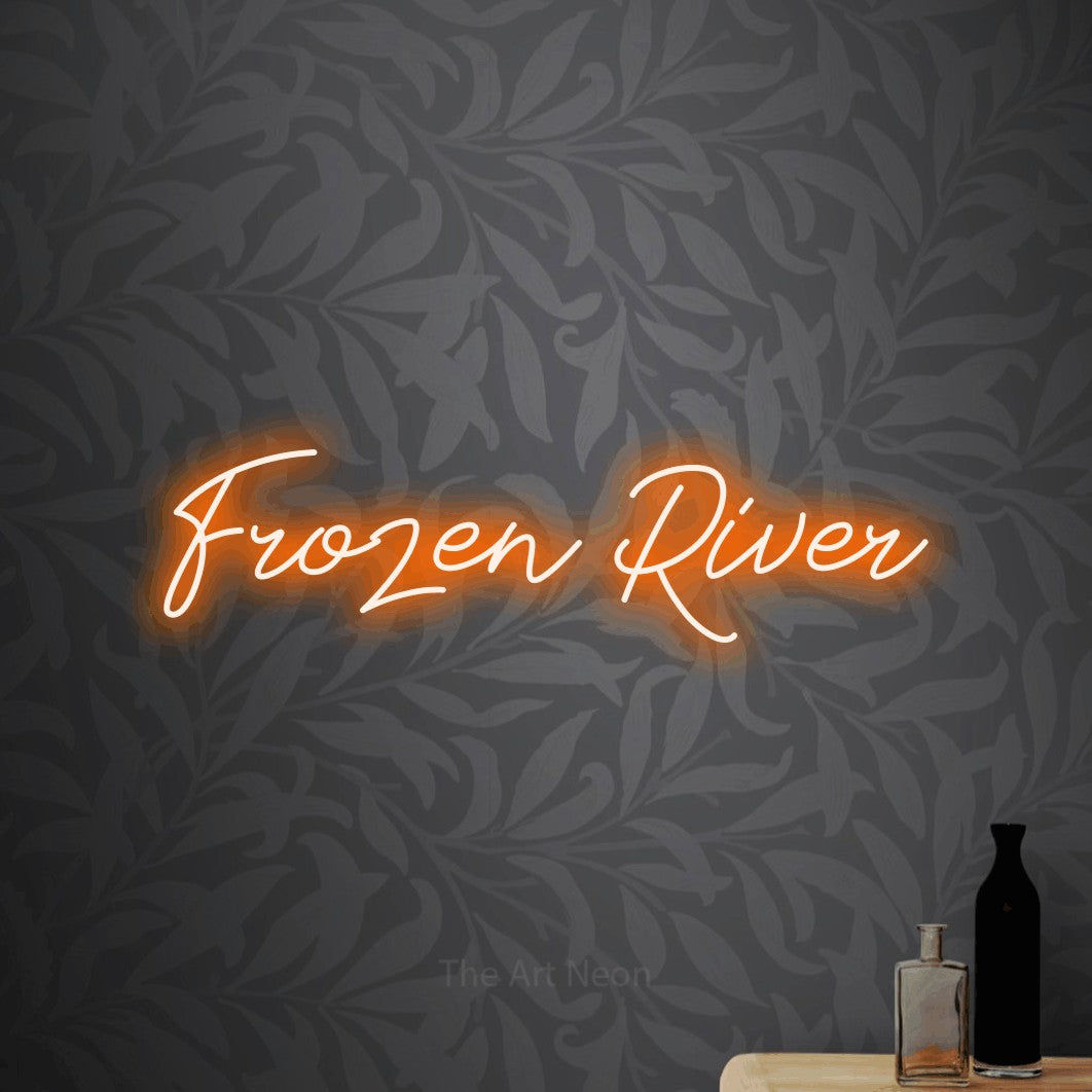 Orange script-style LED neon sign reading "Frozen River" against light grey floral wallpaper