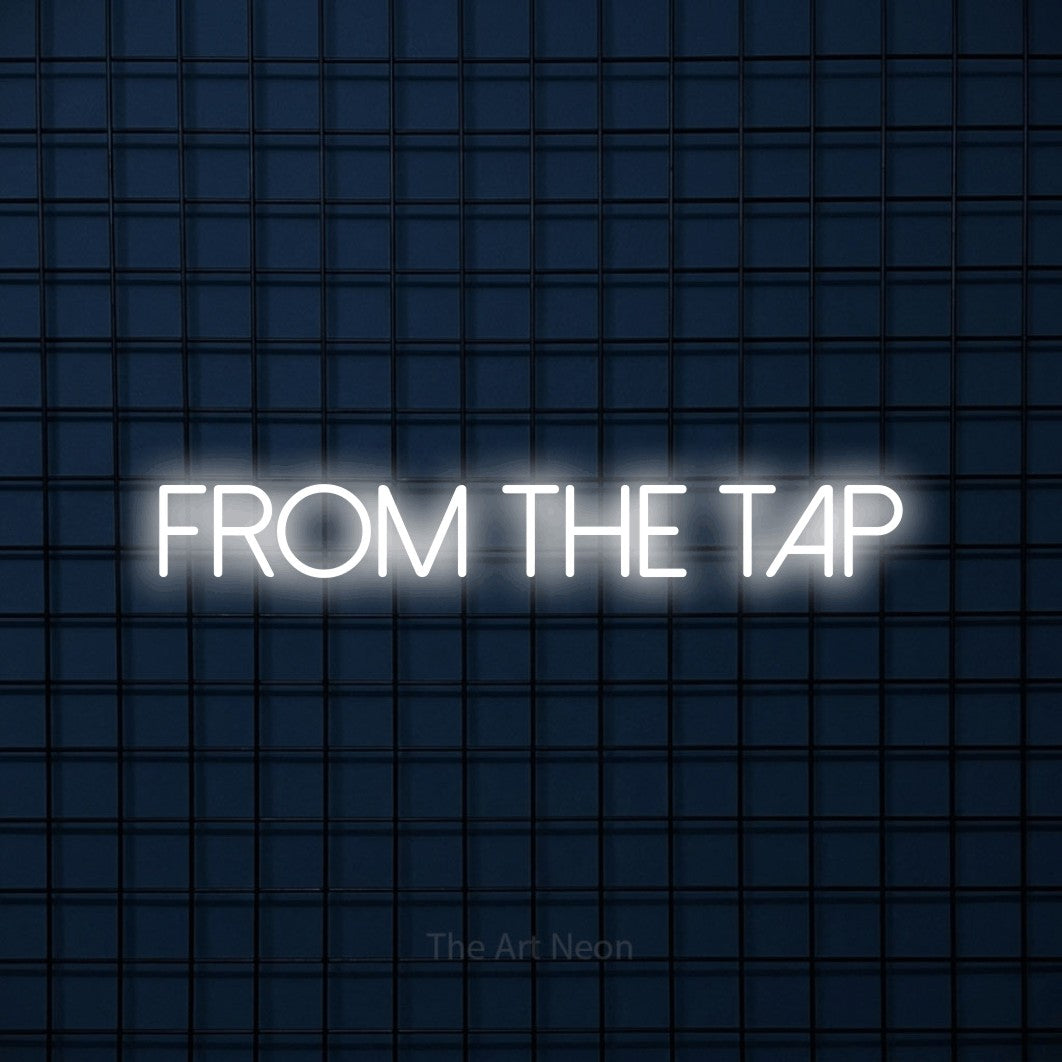 Cool white LED neon sign reading "From the Tap" against a dark blue tiled wall