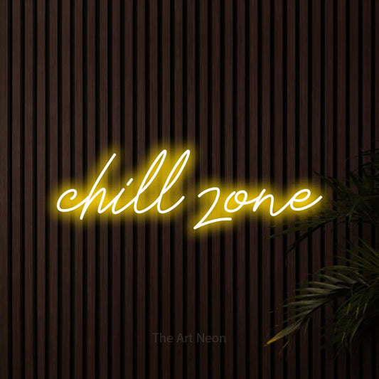 Yellow script-style LED neon sign reading "Chill Zone" against dark wooden slats for bedroom décor