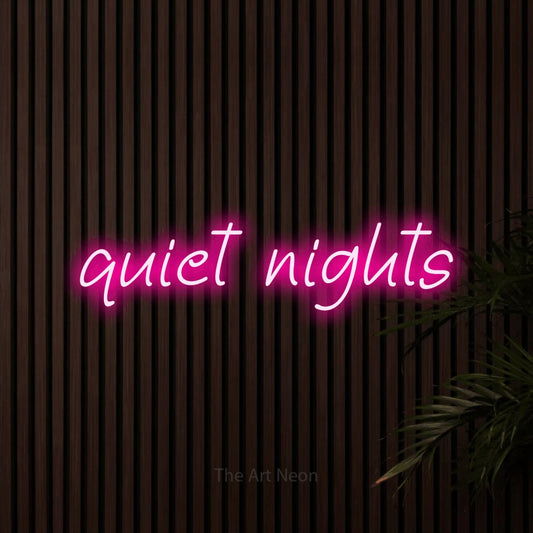 Hot pink LED neon sign reading "Quiet Nights" against dark wooden slats for bedroom décor