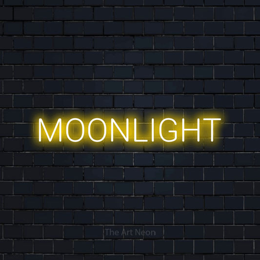 Yellow LED neon sign reading "Moonlight" against a dark navy brick wall for bedroom décor