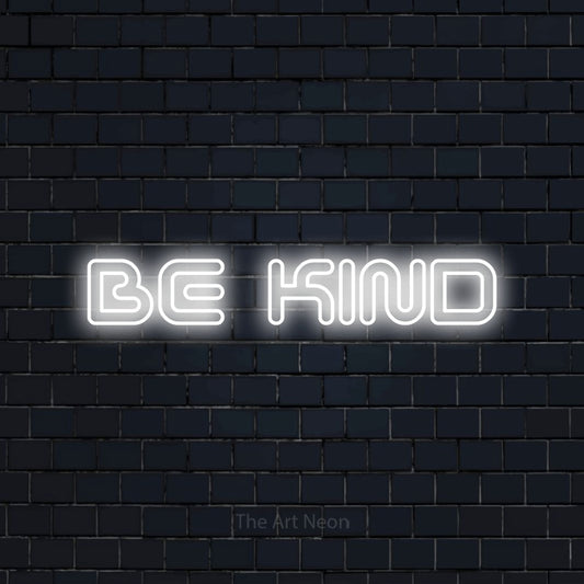 Cool white outline-style LED neon sign reading "Be Kind" against a dark navy brick wall for bedroom décor