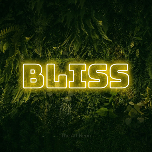 Yellow outline-style LED neon sign reading "Bliss" against a moss-covered green wall for bedroom décor