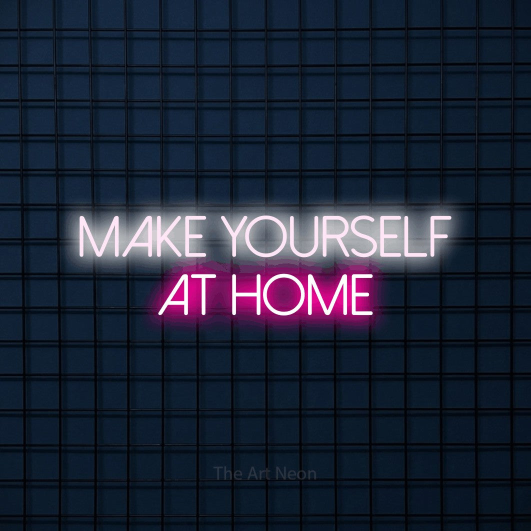 Hot pink and cool white LED neon sign reading "Make Yourself at Home" against a dark blue tiled wall for living room décor