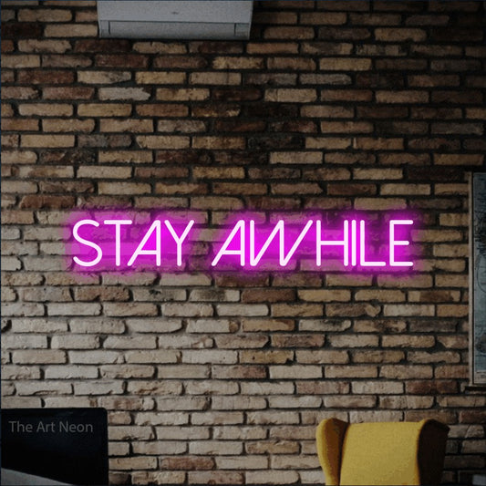 Enseigne néon à DEL à lumière rose, affichant « Stay Awhile » sur un mur de briques rustique, pour décorer un salon