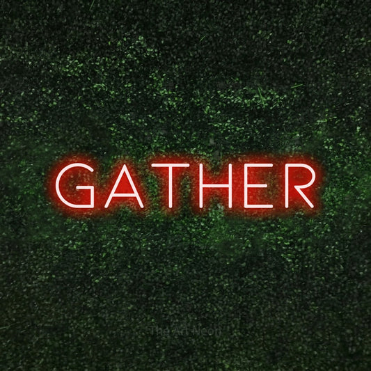 Red LED neon sign reading "Gather" against a textured green moss wall for living room décor