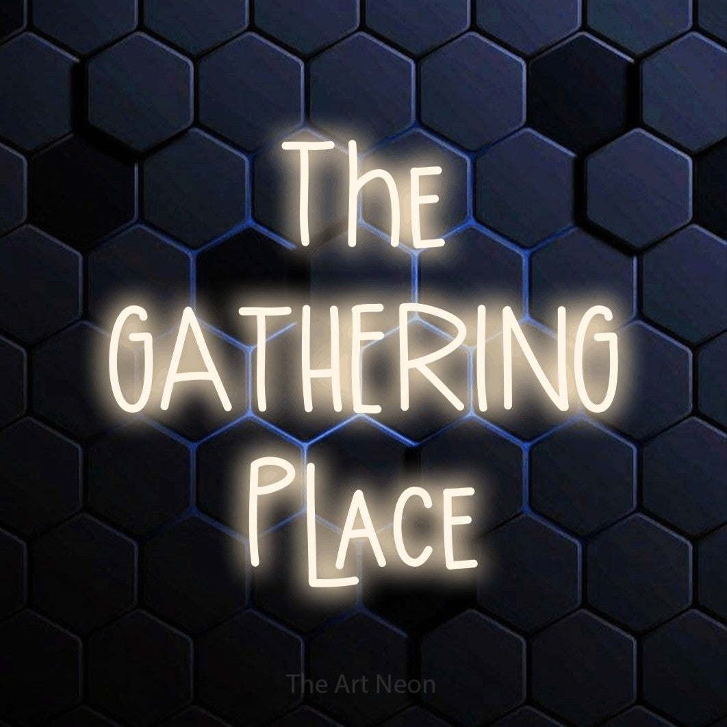 Warm white LED neon sign reading "The Gathering Place" against a blue hexagonal wall for living room décor