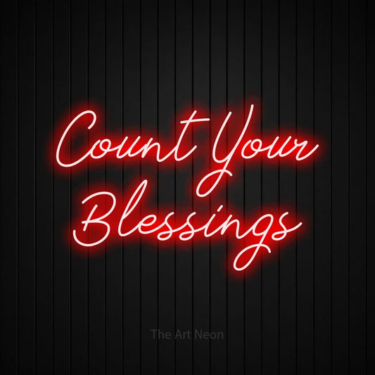 Enseigne néon à DEL à lumière rouge, de style manuscrit, affichant « Count Your Blessings » sur un mur noir à lattes verticales, pour décorer un salon