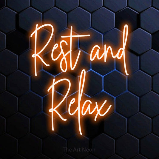 Orange script-style LED neon sign reading "Rest and Relax" against a blue hexagonal wall for living room décor
