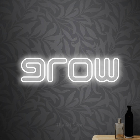 Cool white outline-style LED neon sign reading "Grow" against light grey floral wallpaper for living room décor