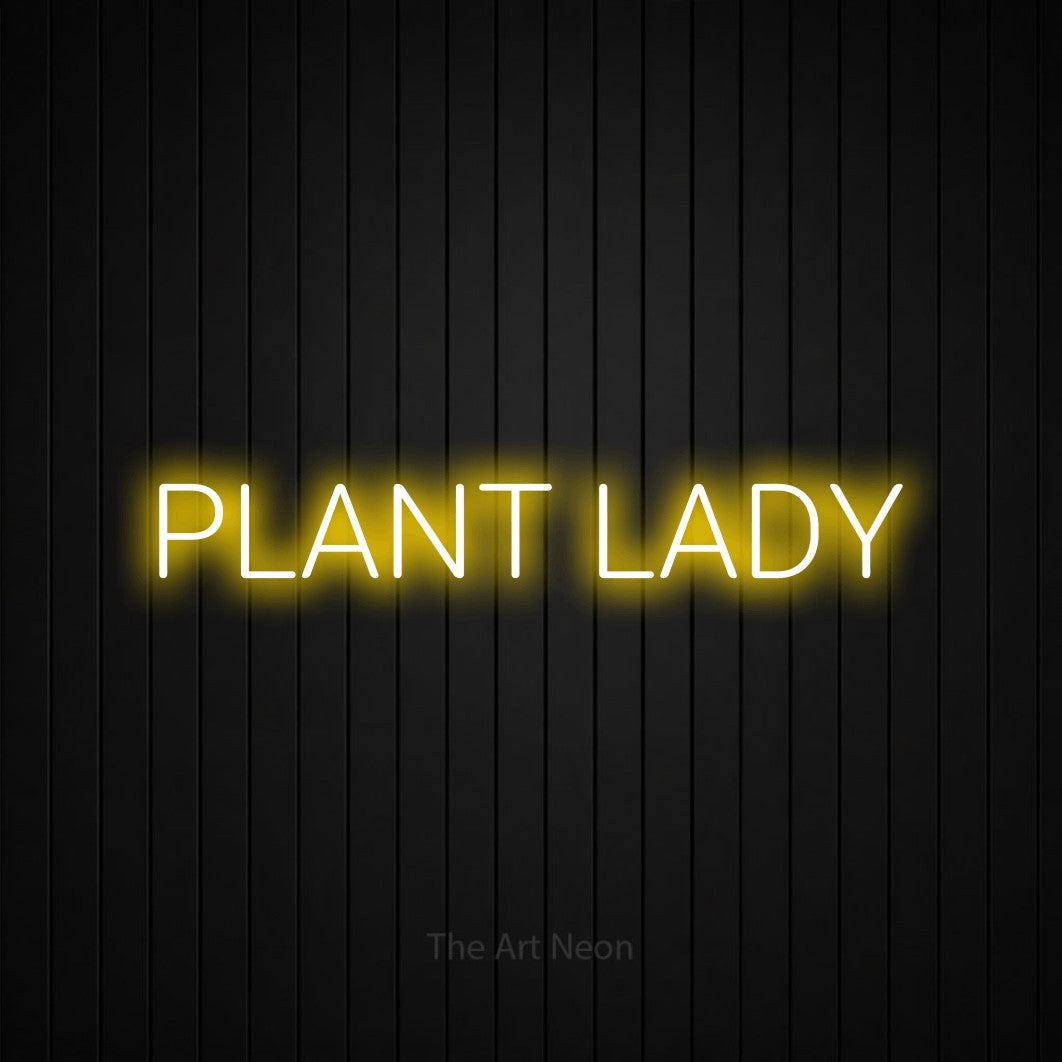 Enseigne néon à DEL à lumière jaune, affichant « Plant Lady » sur un mur noir à lattes verticales, pour décorer un salon