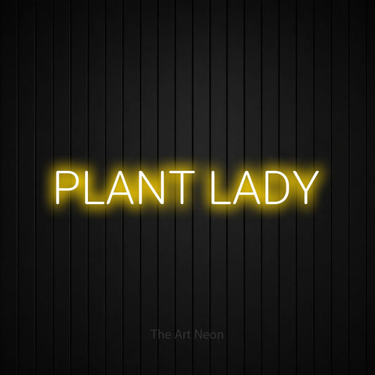Yellow LED neon sign reading "Plant Lady" against a black vertical slat wall for living room décor