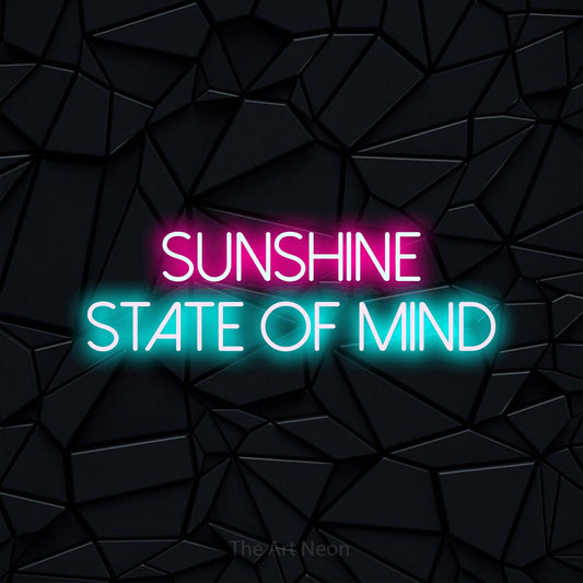 Ice blue and hot pink LED neon sign reading "Sunshine State of Mind" against a black faceted wall for living room décor
