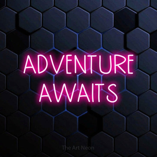 Hot pink LED neon sign reading "Adventure Awaits" against a blue hexagonal wall for living room décor