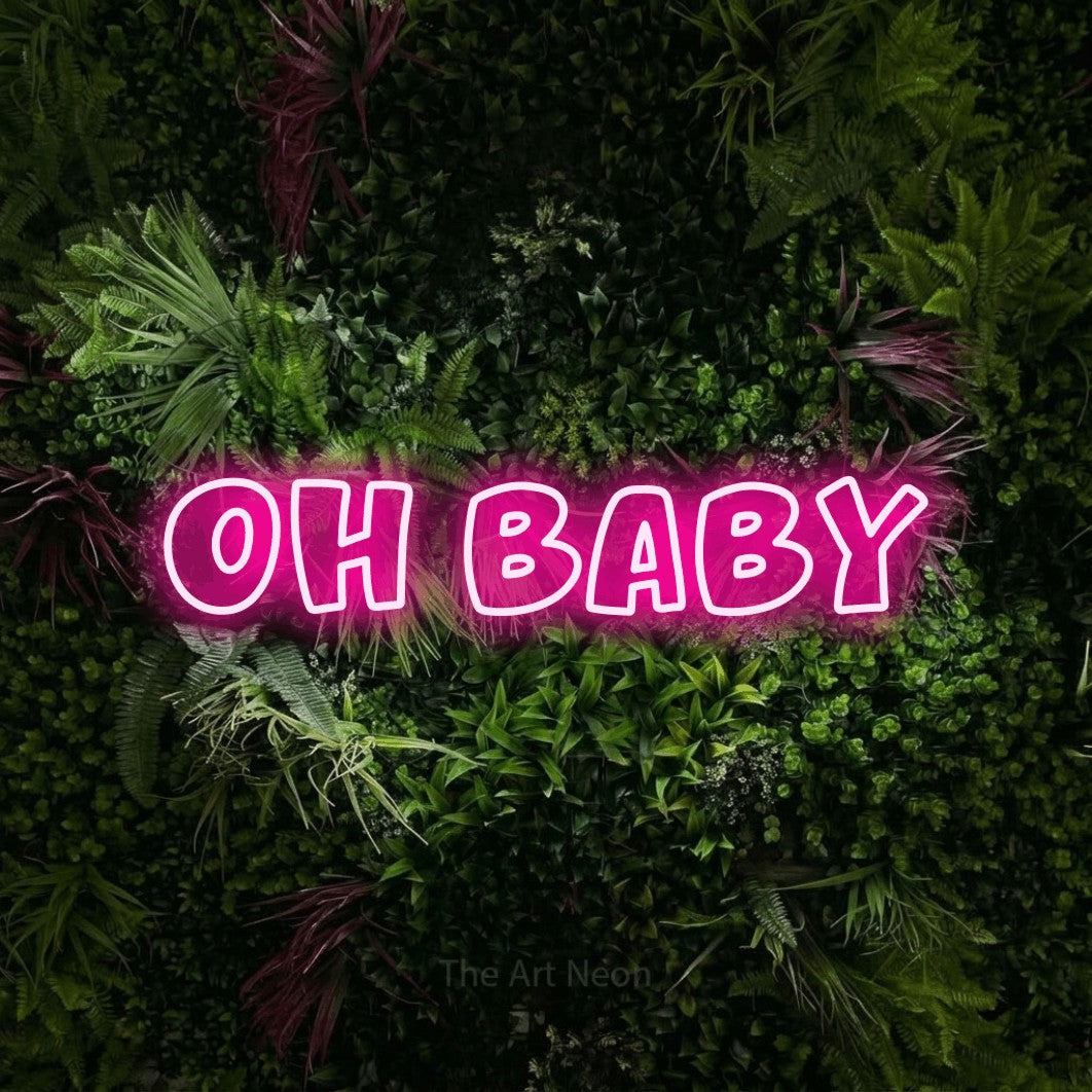 Enseigne néon à DEL à lumière rose vif, de style contour, affichant « Oh Baby » sur un mur de jardin luxuriant aux fleurs roses, pour décorer une chambre de bébé