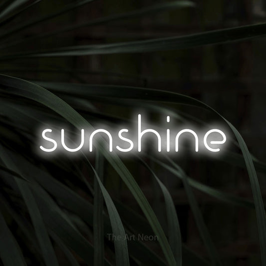 Enseigne néon à DEL à lumière blanche froide, affichant « Sunshine » sur des feuilles tropicales foncées, pour décorer une chambre de bébé