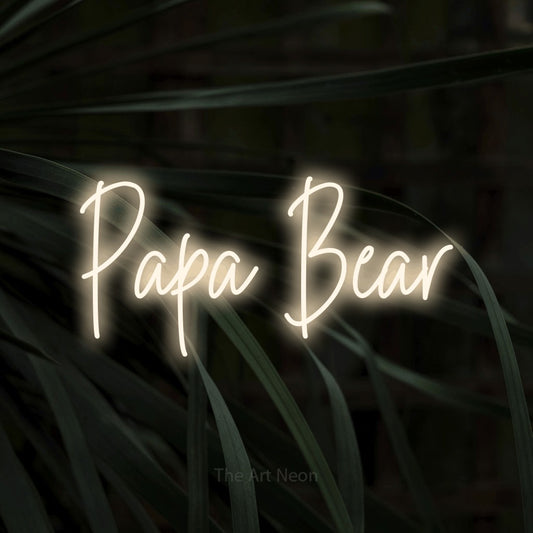 Enseigne néon à DEL à lumière blanche chaude, de style manuscrit, affichant « Papa Bear » sur des feuilles tropicales foncées, pour décorer une chambre de bébé