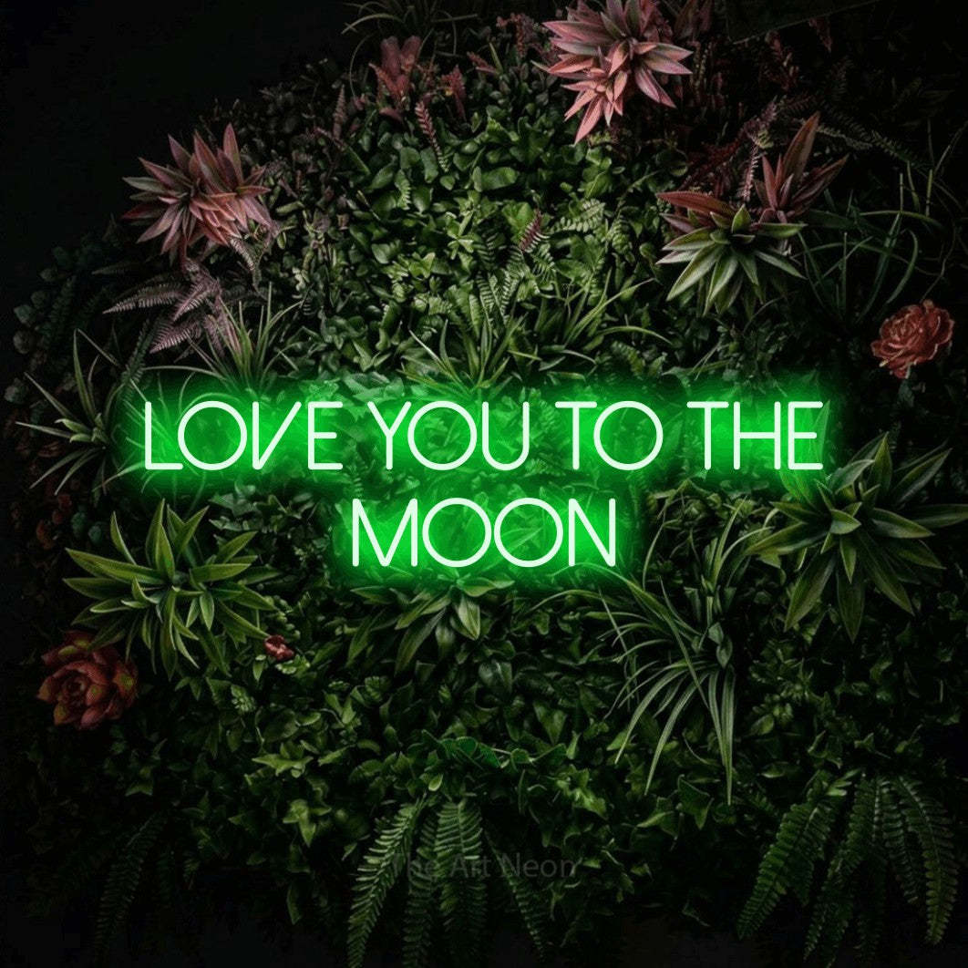 Green LED neon sign reading "Love You to the Moon" against a flowering garden wall for nursery décor