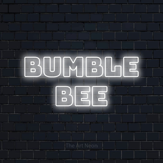 Cool white outline-style LED neon sign reading "Bumble Bee" against a dark navy brick wall for nursery décor