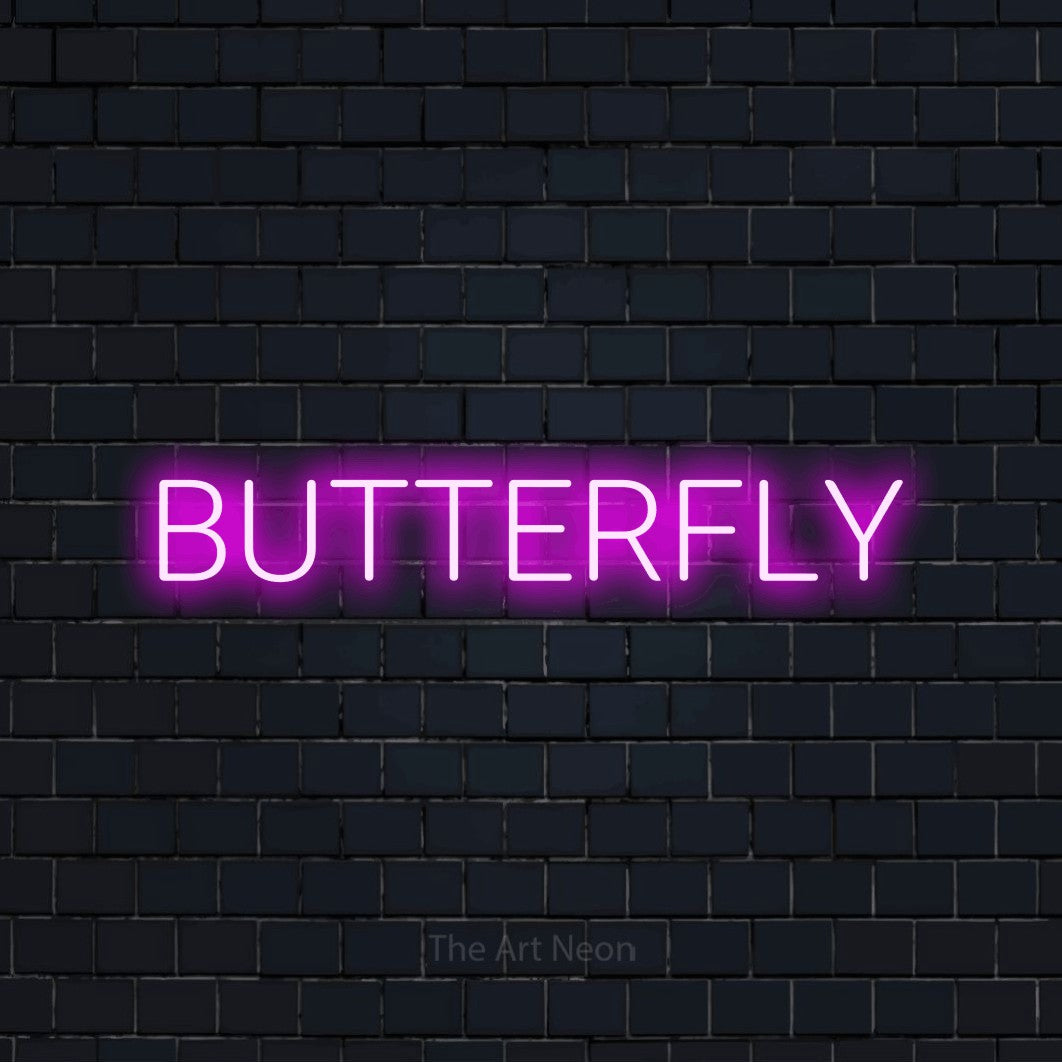 Enseigne néon à DEL à lumière rose, affichant « Butterfly » sur un mur de briques bleu marine foncé, pour décorer une chambre de bébé