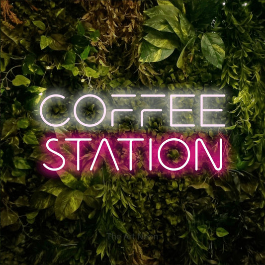 Hot pink and cool white LED neon sign reading "Coffee Station" against a textured moss and foliage wall for kitchen décor