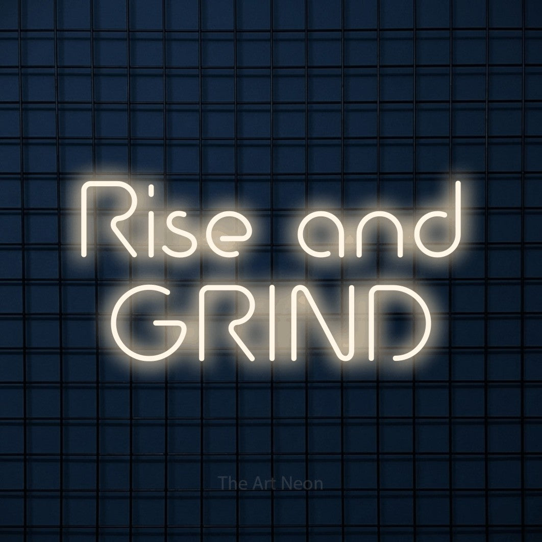 Warm white LED neon sign reading "Rise and Grind" against a dark blue tiled wall for kitchen décor