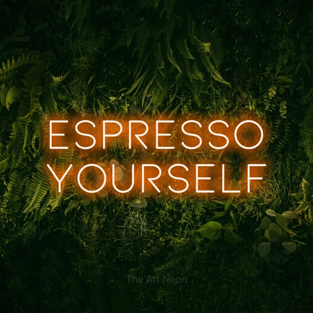 Orange LED neon sign reading "Espresso Yourself" against a moss-covered green wall for kitchen décor
