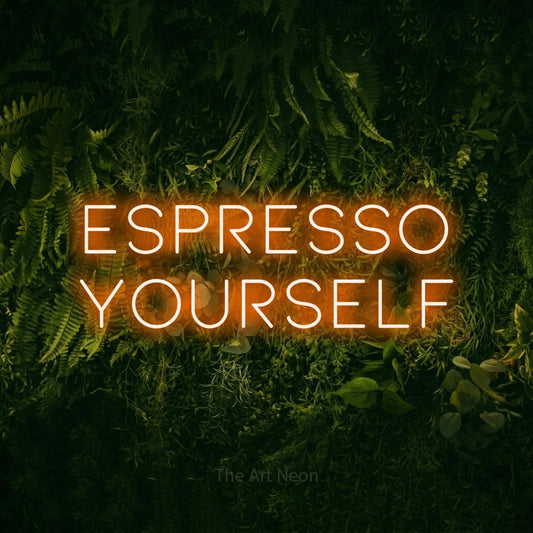 Orange LED neon sign reading "Espresso Yourself" against a moss-covered green wall for kitchen décor