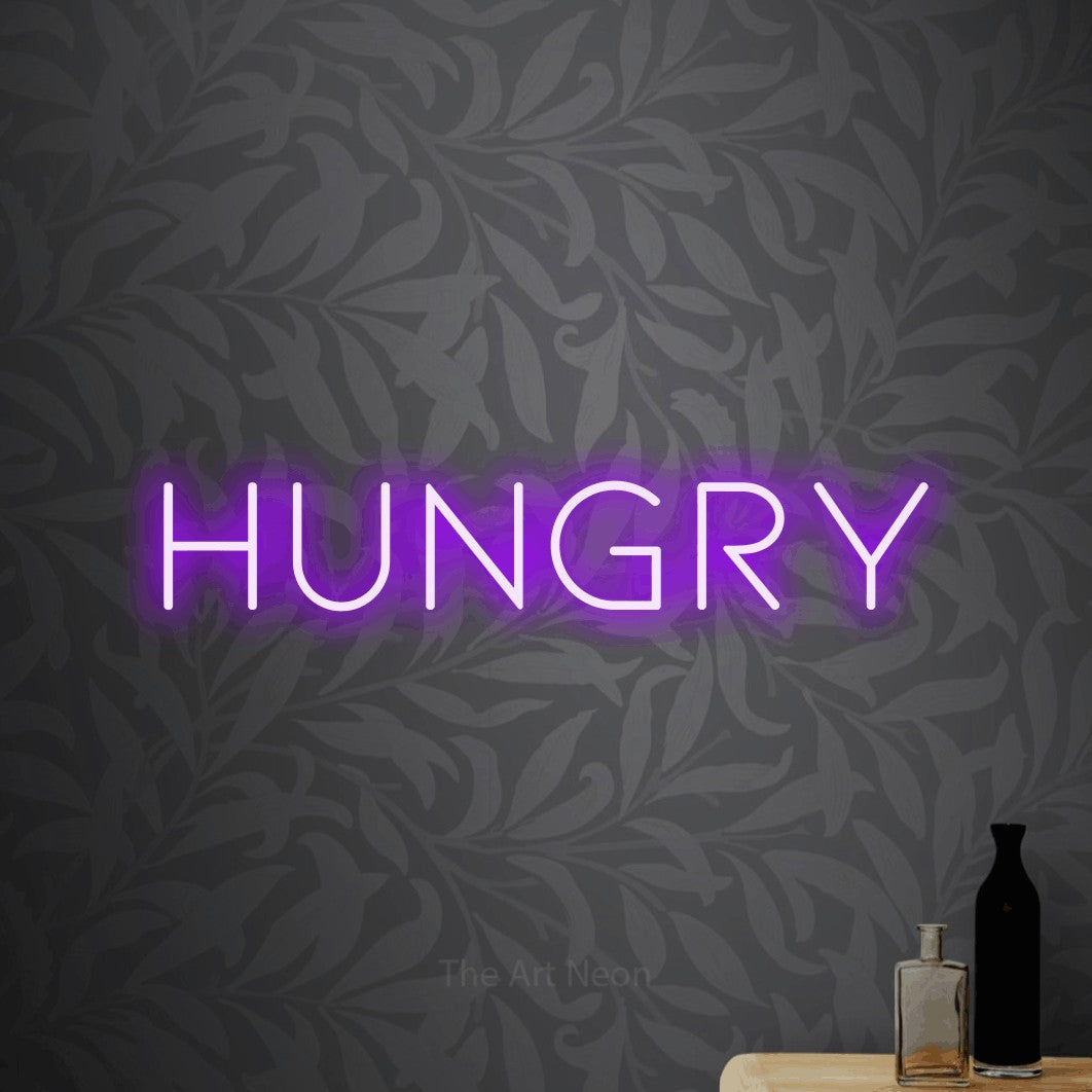 Purple LED neon sign reading "Hungry" against light grey floral wallpaper for kitchen décor