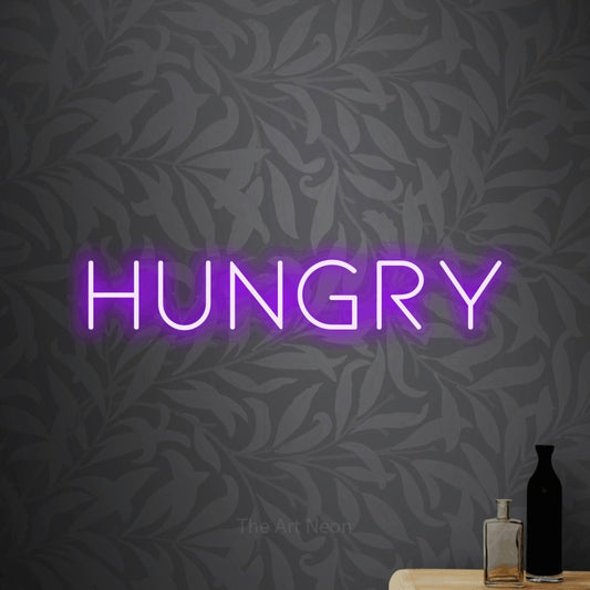 Purple LED neon sign reading "Hungry" against light grey floral wallpaper for kitchen décor