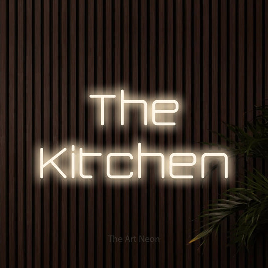 Warm white LED neon sign reading "The Kitchen" against dark wooden slats for kitchen décor