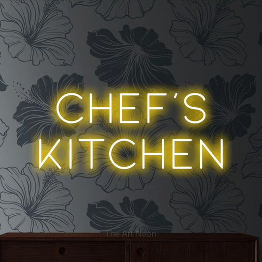 Yellow LED neon sign reading "Chef's Kitchen" against grey floral wallpaper for kitchen décor