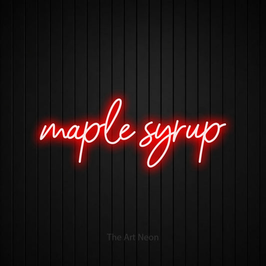 Red script-style LED neon sign reading "Maple Syrup" against a black vertical slat wall for kitchen décor