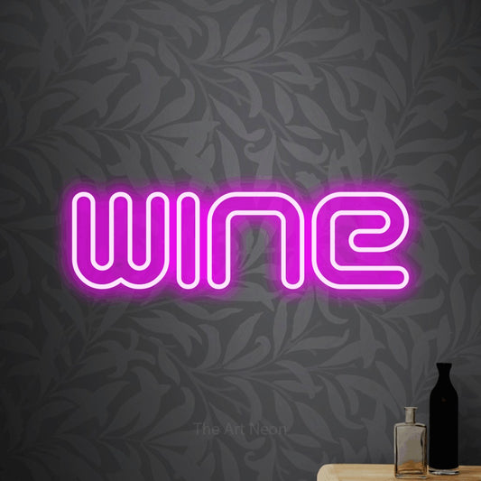 Pink outline-style LED neon sign reading "Wine" against light grey floral wallpaper for kitchen décor